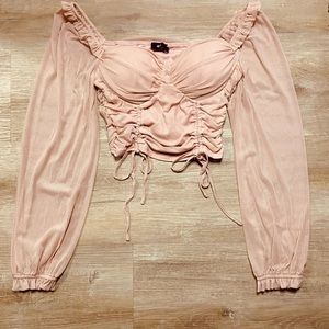 Mesh top with strings detail.